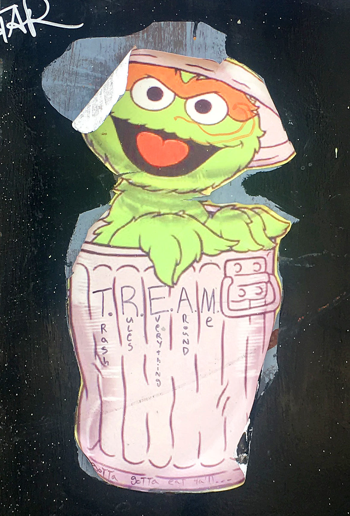 paste up illustration of oscar the grouch from Sesame Street
