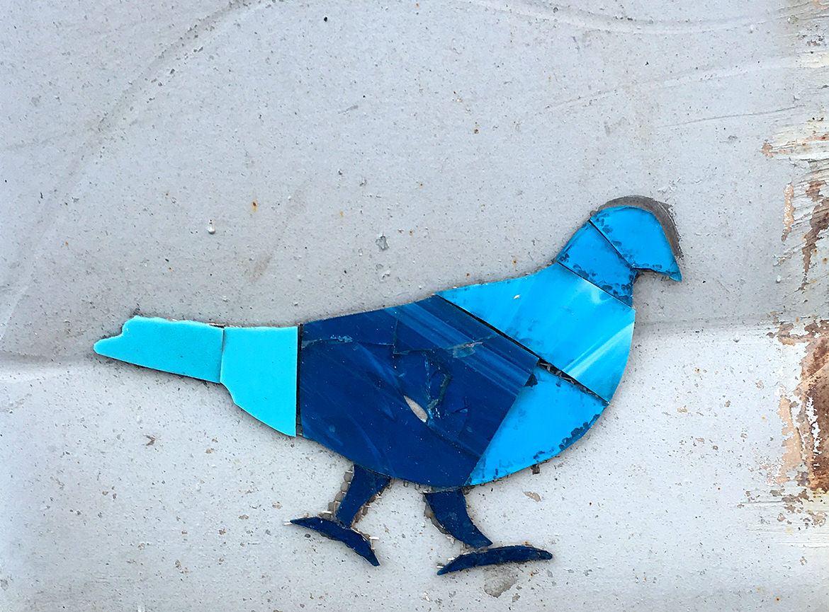 mosaic in blue tile of a pigeon