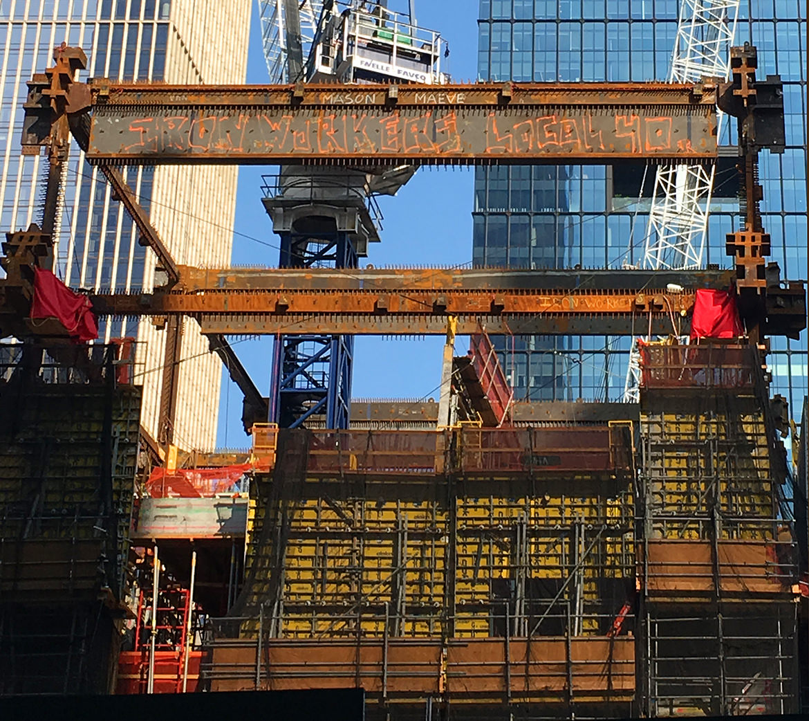 A construction site for a new skyscraper as the iron beams are fitted in place