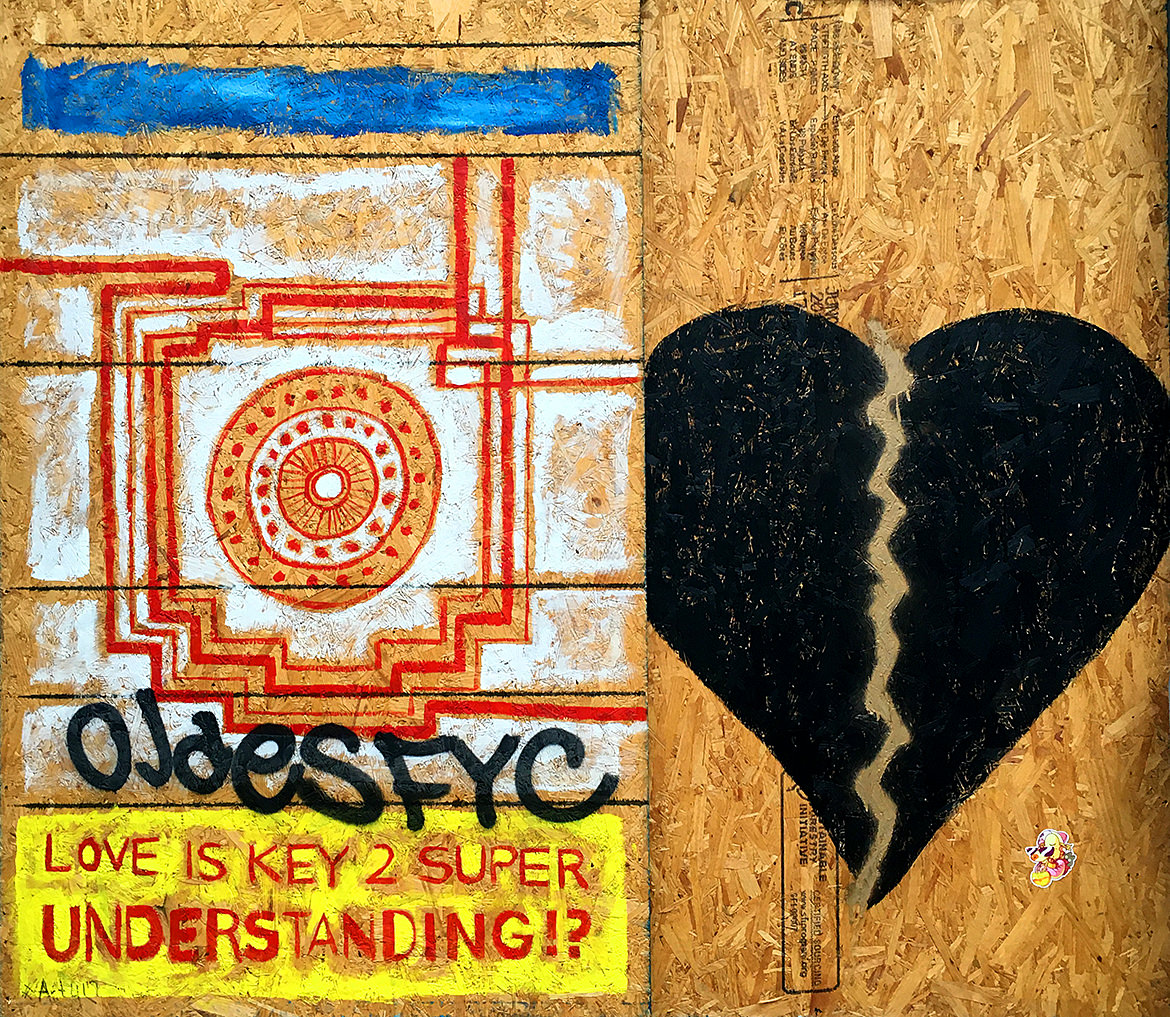 Spray paint graffiti of a pattern and a broken black heart with the phrase, "Love is key 2 super understanding"